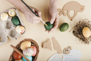 top-view-woman-decorating-easter-eggs-4564867